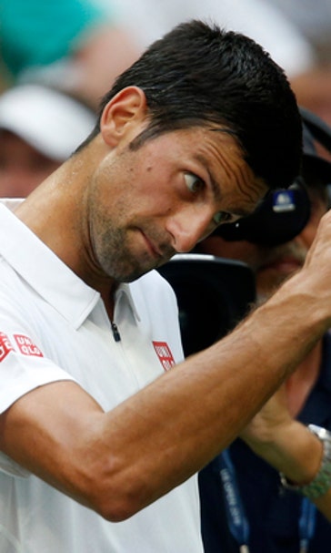 Djokovic gets a 2nd free pass at US Open when Youzhny quits